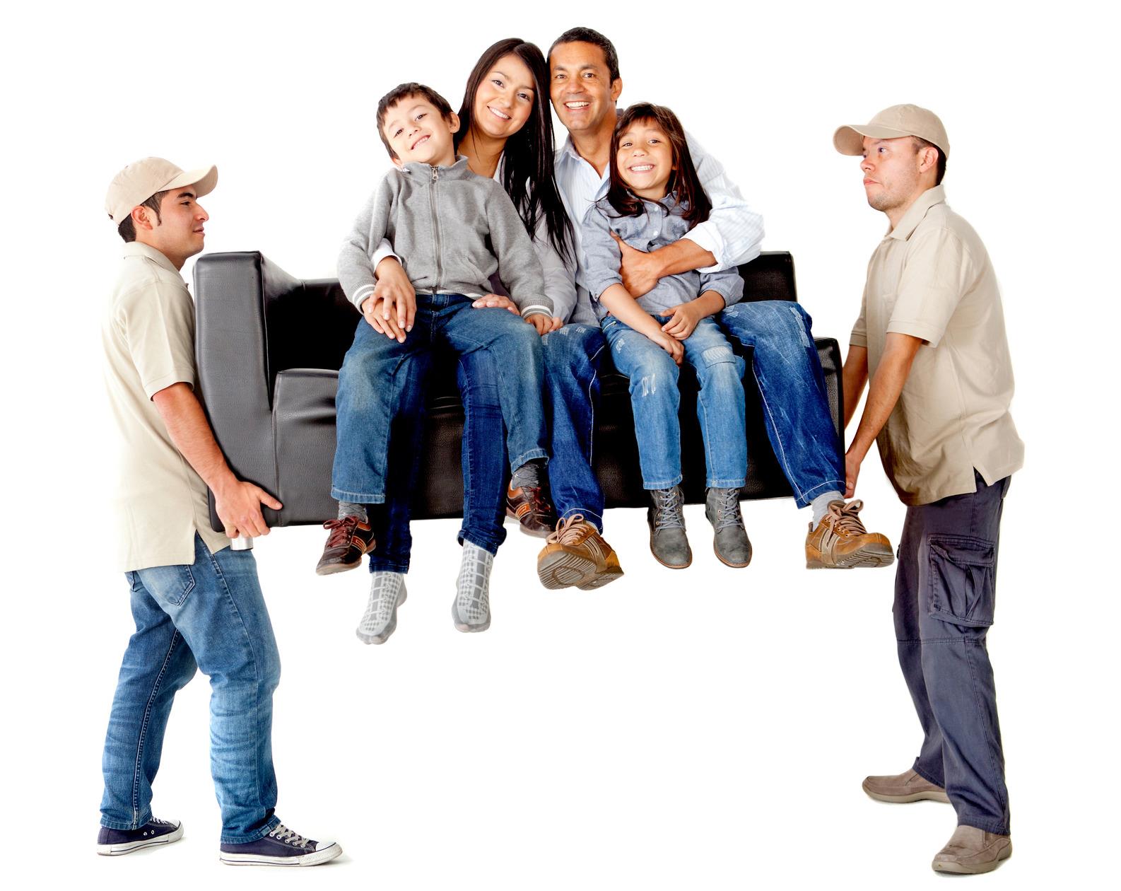 Men carrying a sofa with a family moving house - isolated over a white background